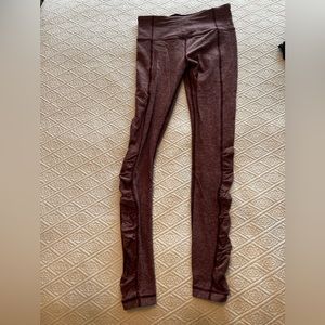 Lululemon size 6 leggings. Super soft with leg scrunch detail. Maroon color